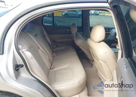 2001 Lincoln Continental z USA, uszkodzony, nr VIN 1LNHM97V31Y736149